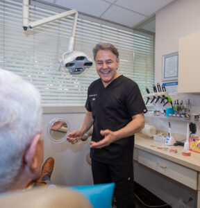 Doctor explaining to patient about dental procedure