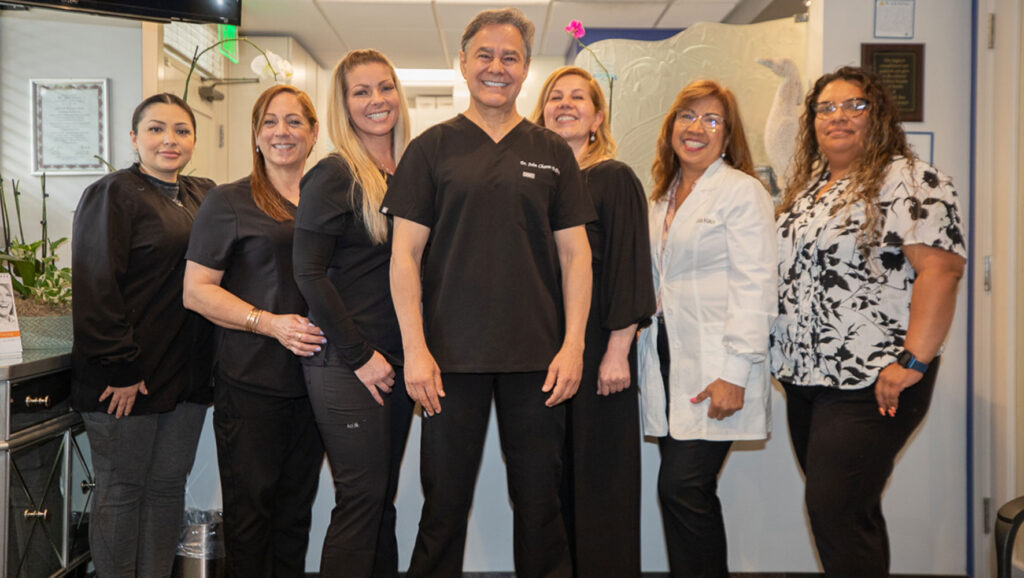 group picture of the staff within the dental practice