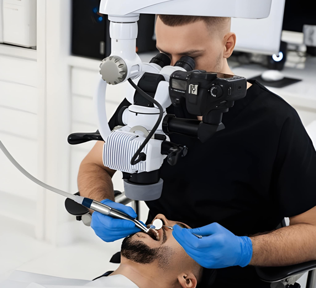 Dentist performing root canal treatment with microscope in Woodland Hills, California.